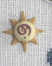 Swirly Sun Button
